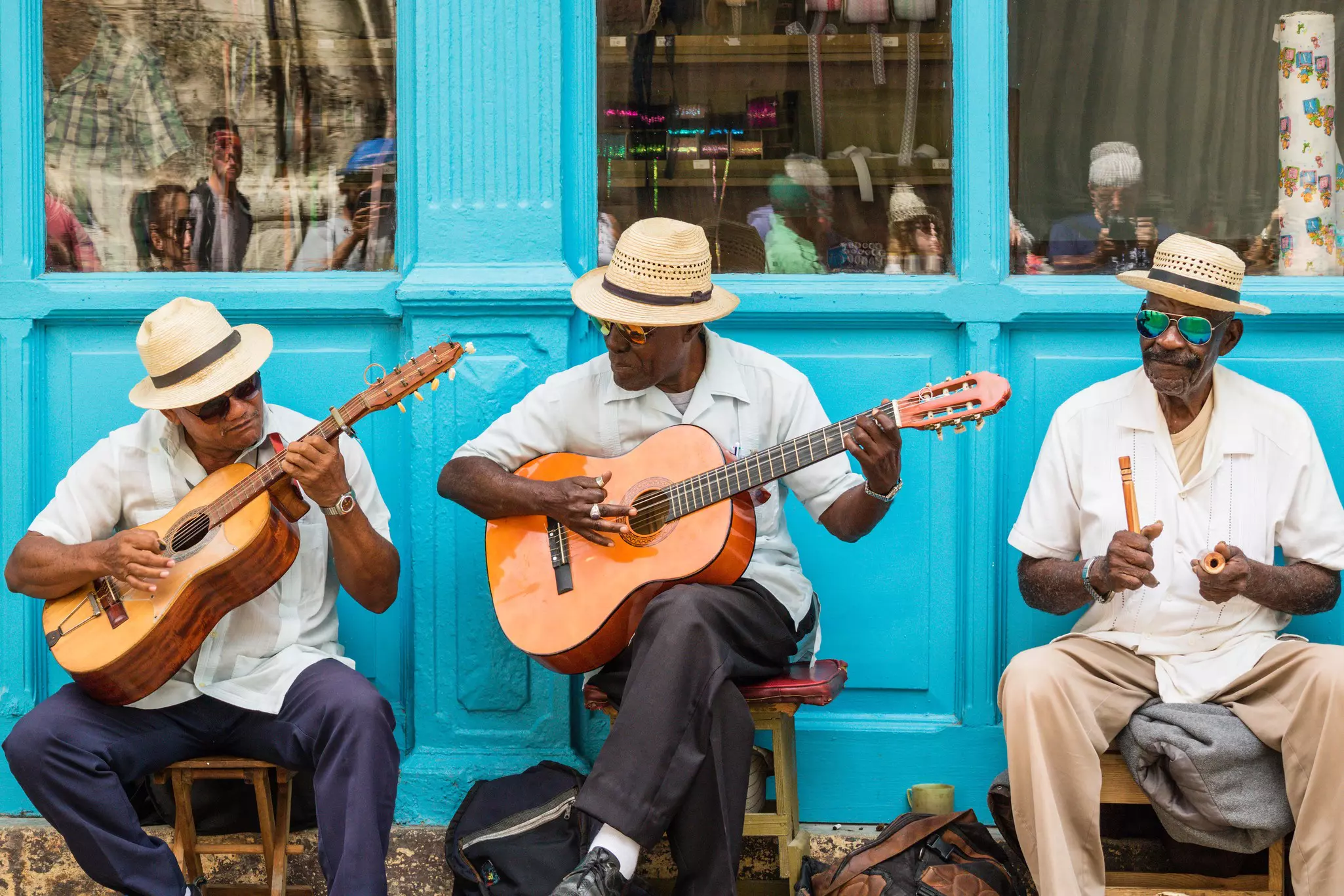 Havana, Cuba - March 24, 2017: Elderly street musicians playing traditional cuban music on the street in old Havana
artist, city, entertainment, musicians, show, back, concert, tourism, in