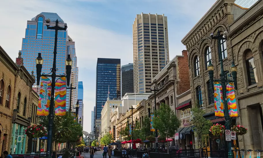 Streetview of buildings on Stephen Avenue Walk at sunset in Calgary, Canada.