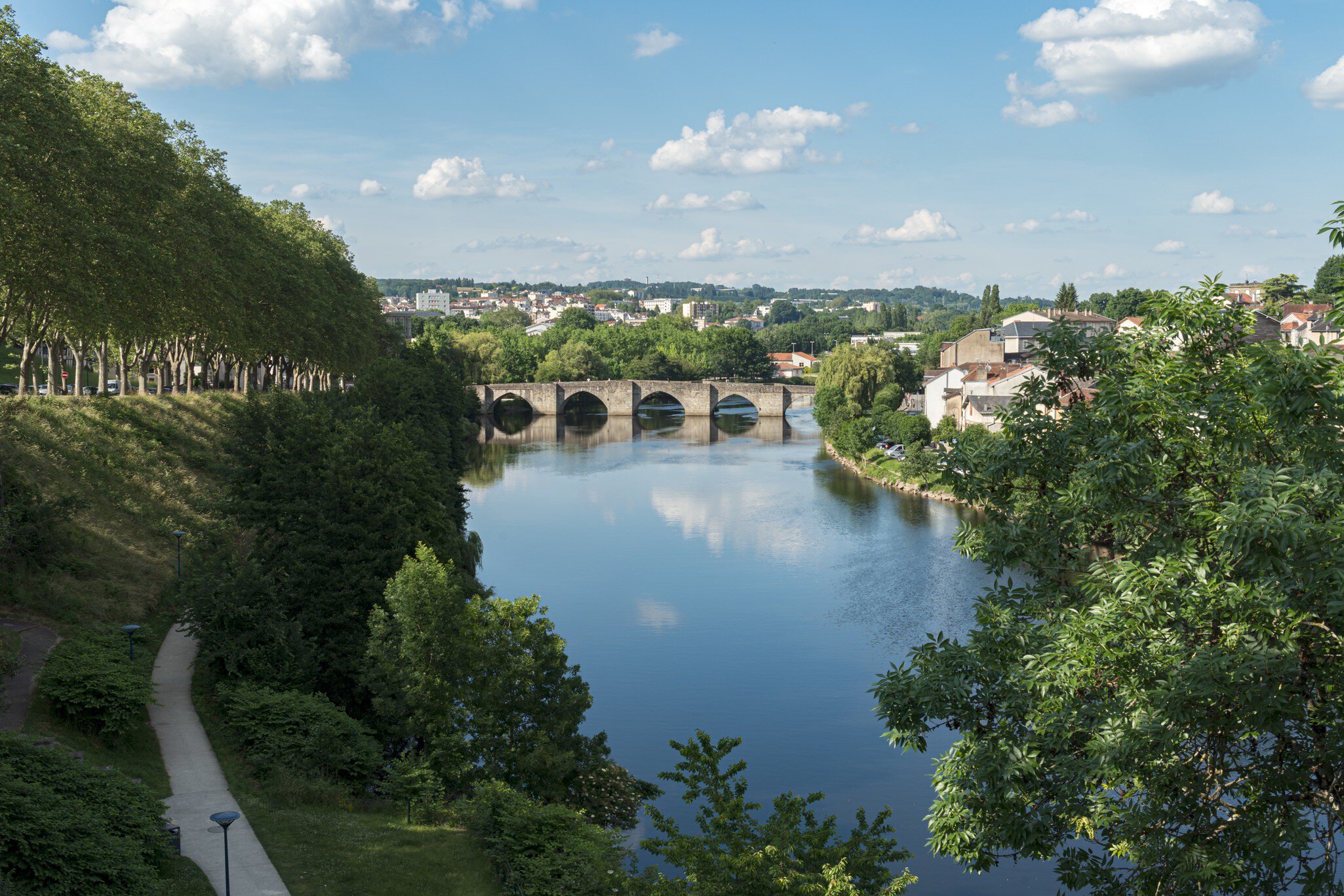 Saint Etienne Bridge in Limoges City with clouds reflection