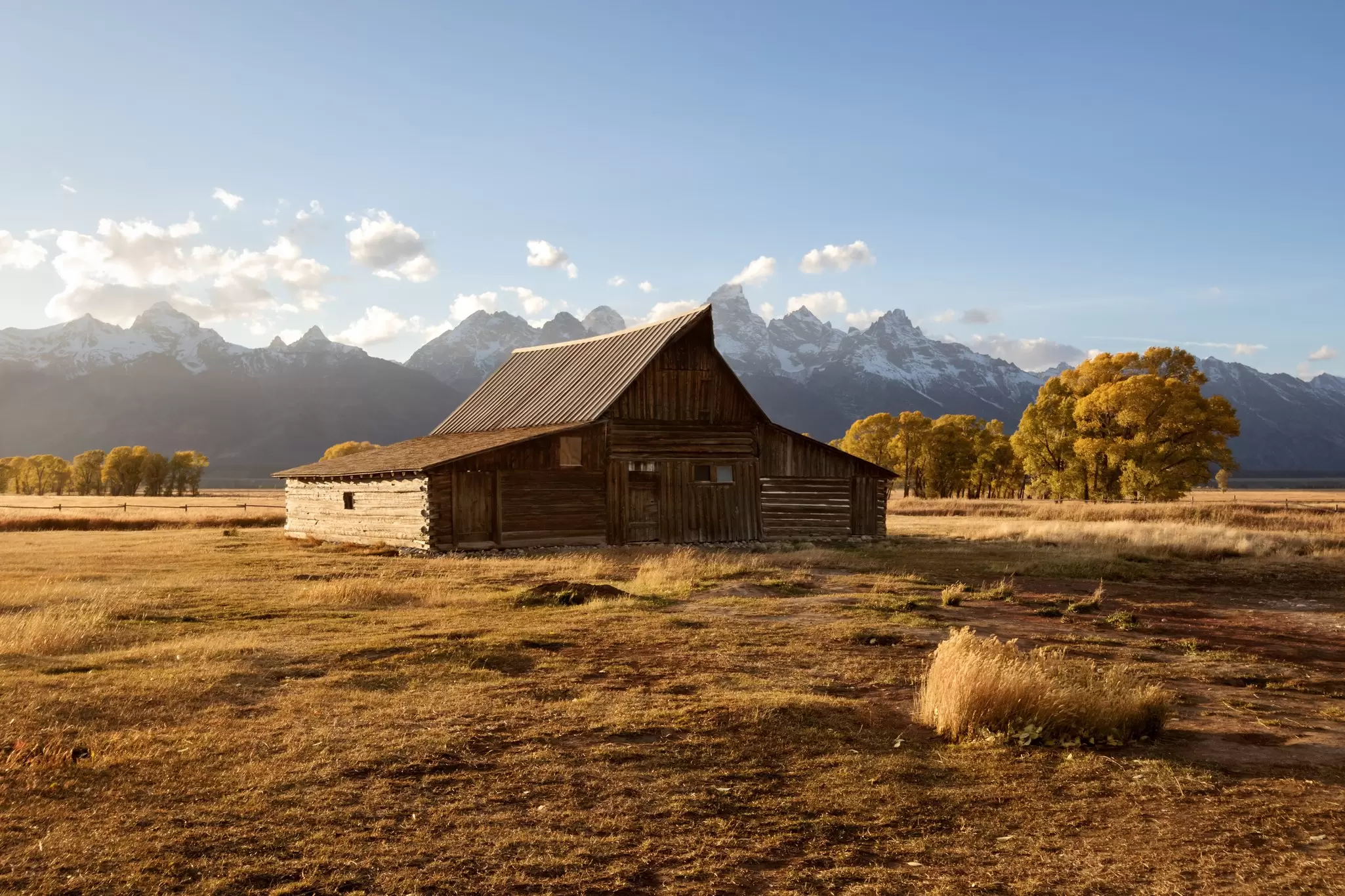 The weathered TA Moulton barn on Mormon Row with the Teton range rising behind