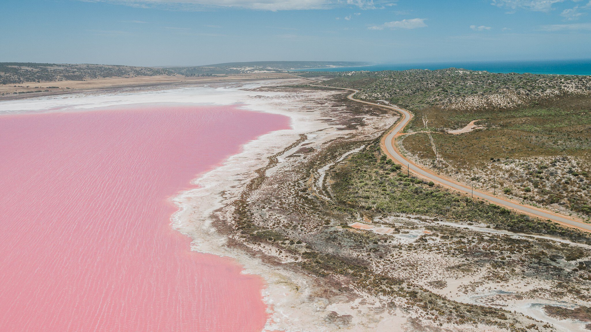 Aerial view of the pink shoreline of Hutt Lagoon near Port Gregory, Western Australia