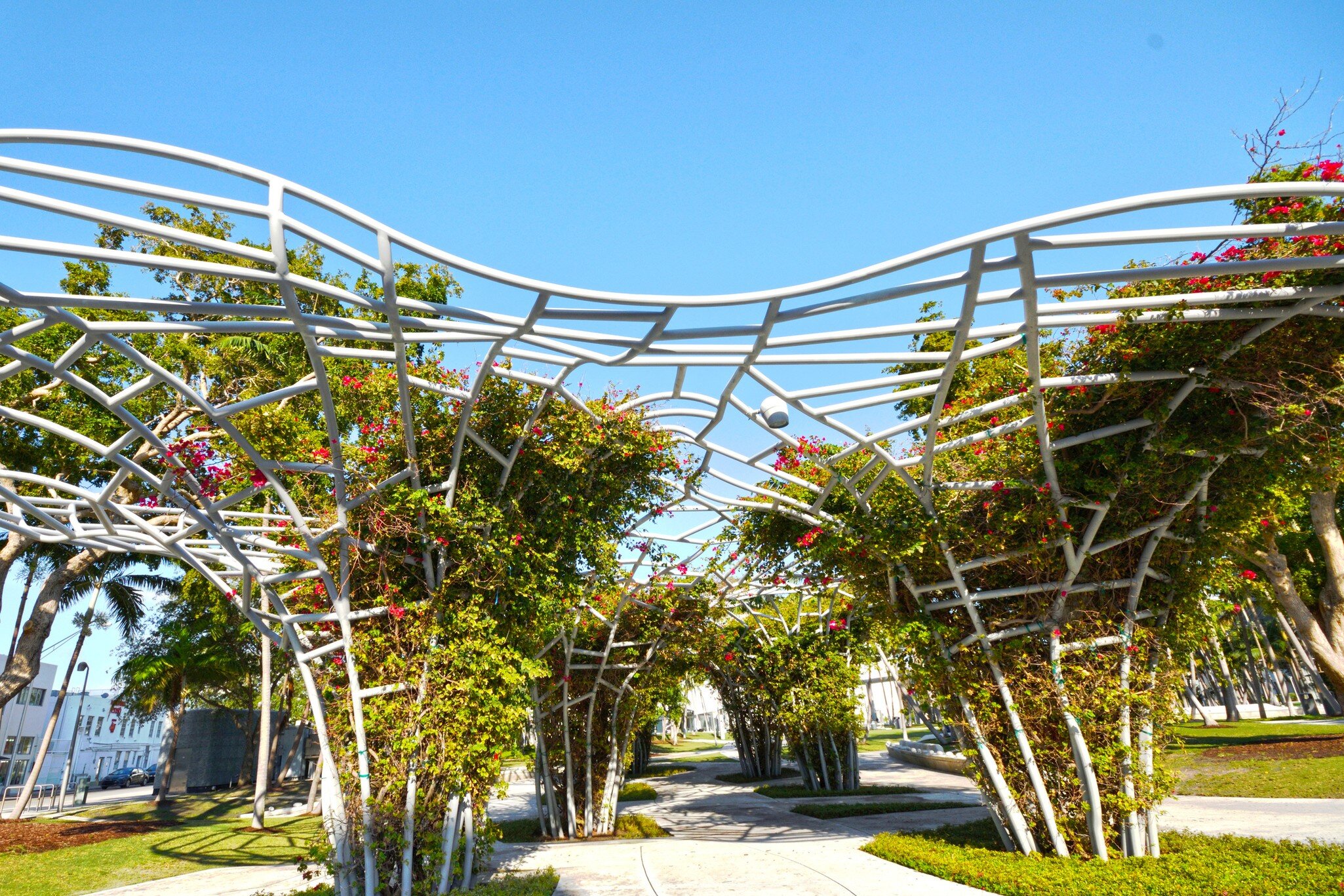 Miami Florida USA - April 11 2018:  People Enjoying the Trellis Landscape of Soundscape Park Miami
959772234
arch, arches, center, enjoying, florida, garden, green, palm, park, path, peaceful, public, relaxing, soundscape, spring, tourists, trees,...