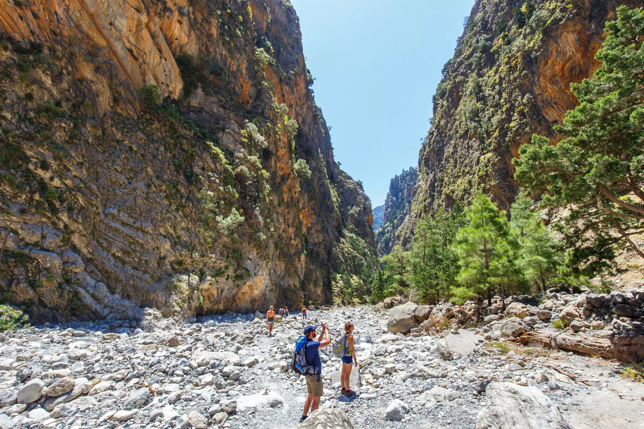 Tourists hike through Samaria Gorge in central Crete.