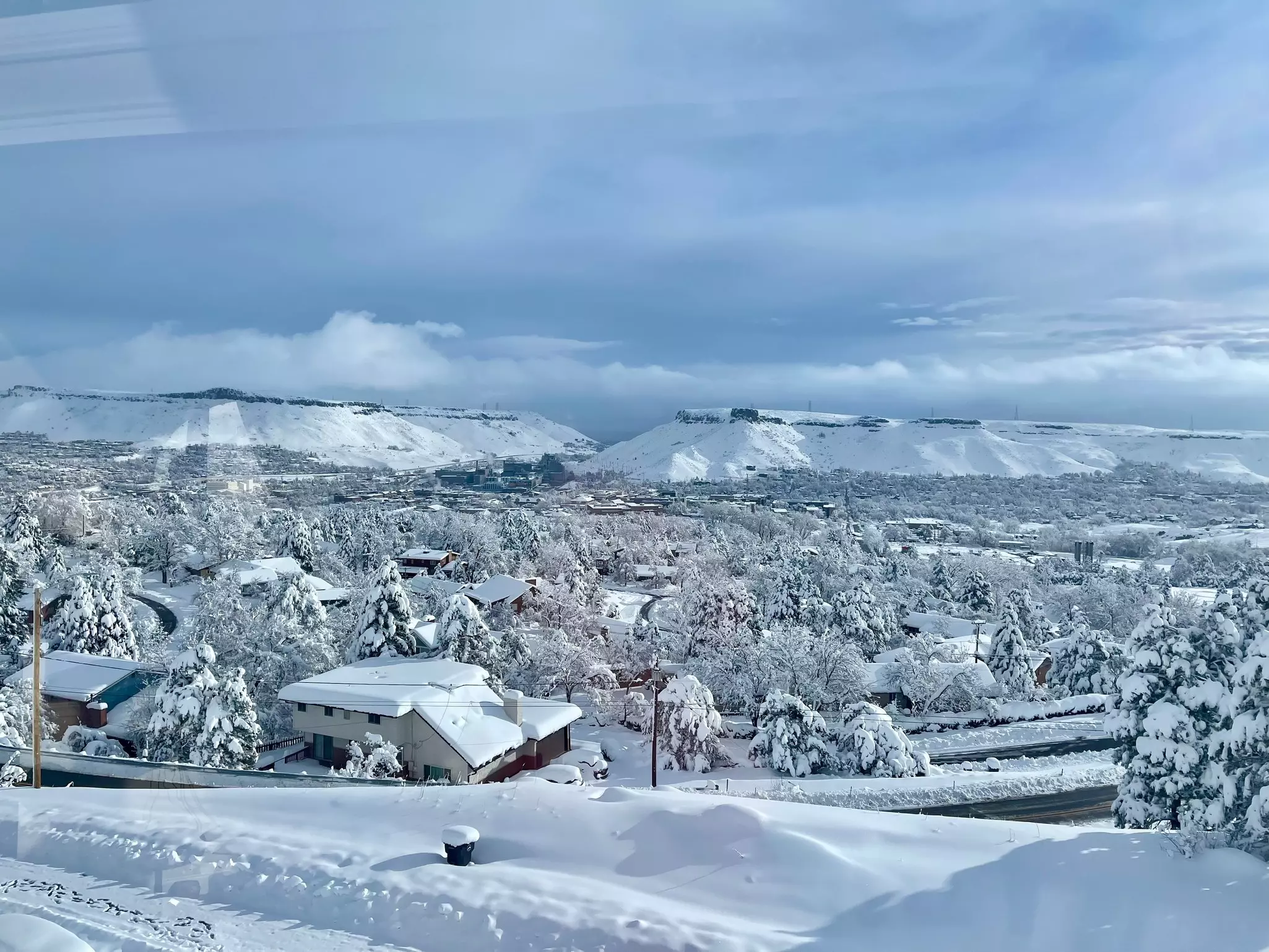 A small mountain town covered in thick snow.