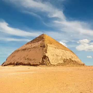 Bent Pyramid under wispy clouds outside Dahshur. 
