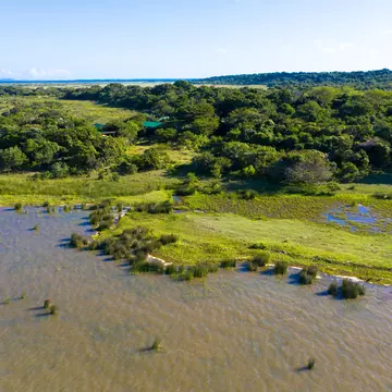 Drone view: Aerial view of iSimangaliso Wetland Park. Maputaland, an area of KwaZulu-Natal on the east coast of South Africa. Wetland Park is a mosaic of ecosystems and an incredible diversity of vegetation and wildlife