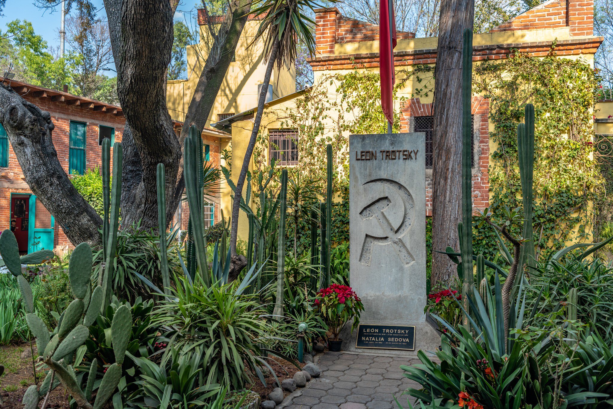 COYOACAN, MEXICO - OCT 28, 2016: Leon Trotsky grave with the Soviet symbolic in his House Museum, a place honoring Lev Davidovich Trotskiy and an organization that works to promote political asylum; Shutterstock ID 528968617;
