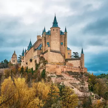 View of the Alcázar of Segovia during autumn in Spain.