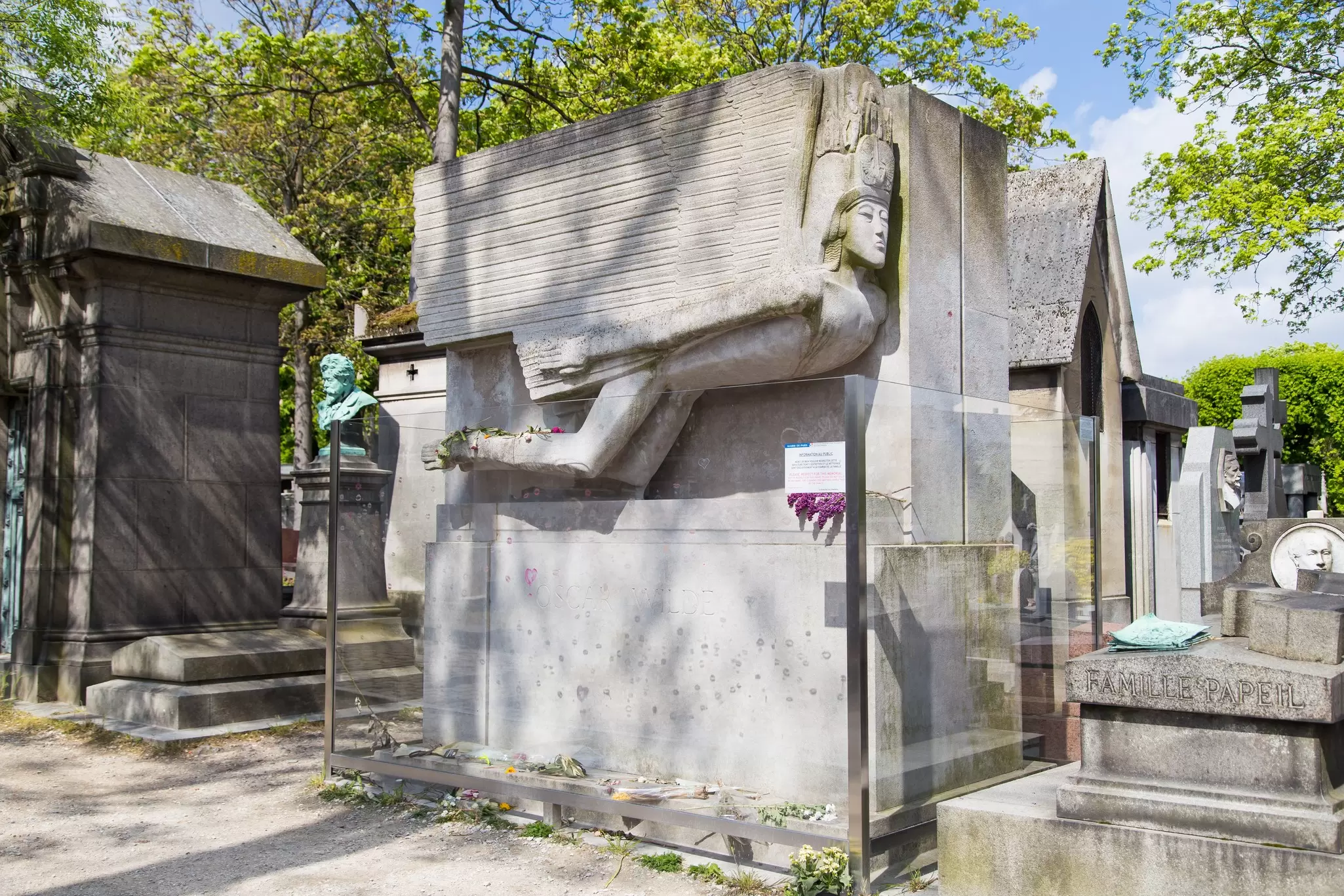 The grave of famous writer Oscar Wilde in Pere Lachaise cemetery, covered in kisses.