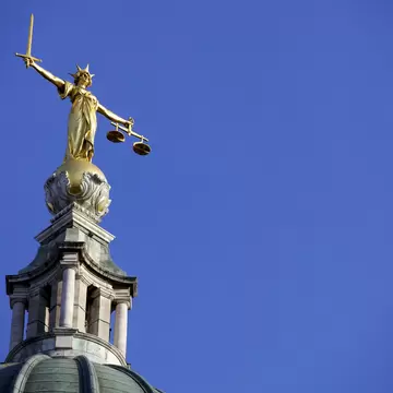 Scales of Justice above the Old Bailey Law Courts (Central Criminal Court) on former site of Newgate Prison, London, England, United Kingdom, Europe