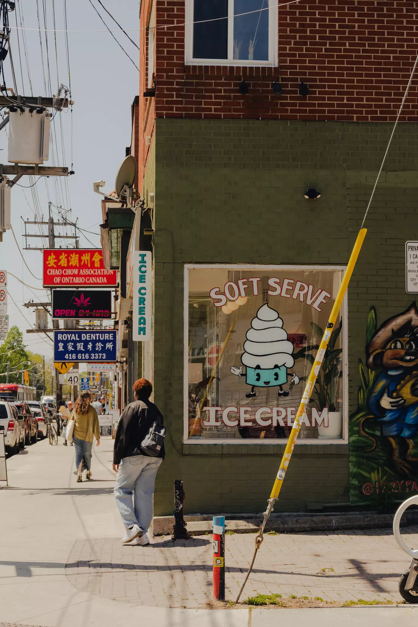 People outside an ice cream parlor