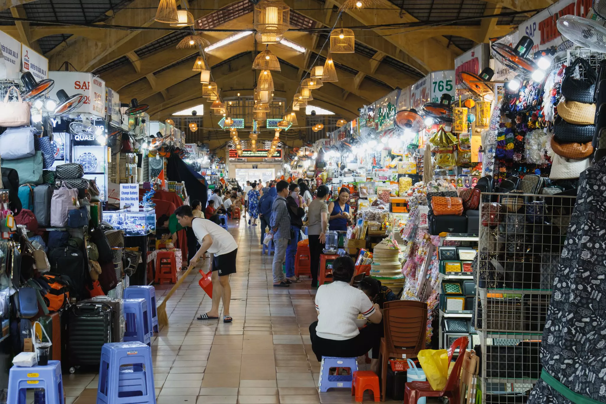 A big market selling backpacks and other items.