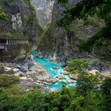 Bright turquoise water in a ravine at Swallow Grotto at Taroko National Park, Taiwan.