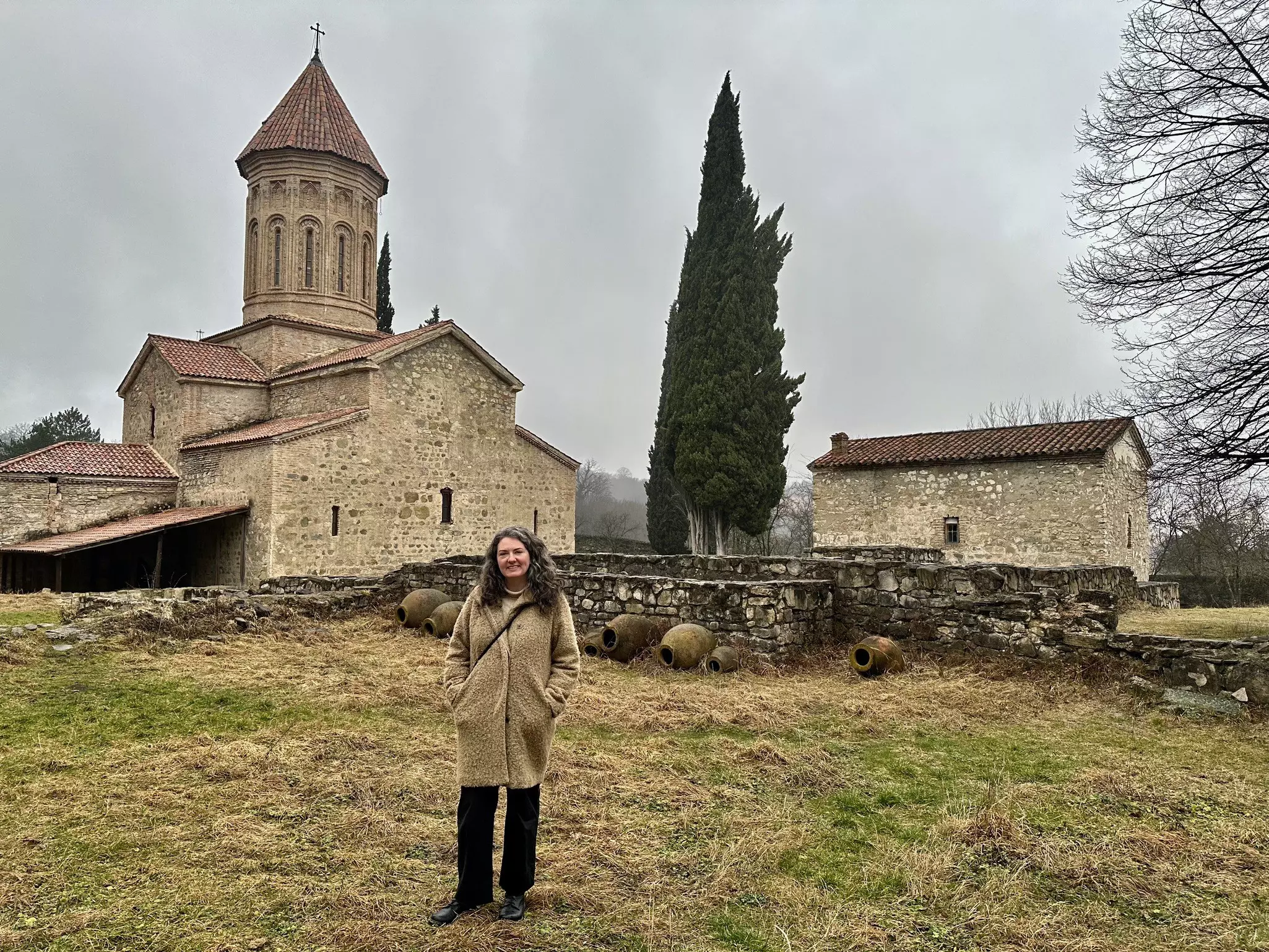 Alex Butler standing outside a monastery in Georgia