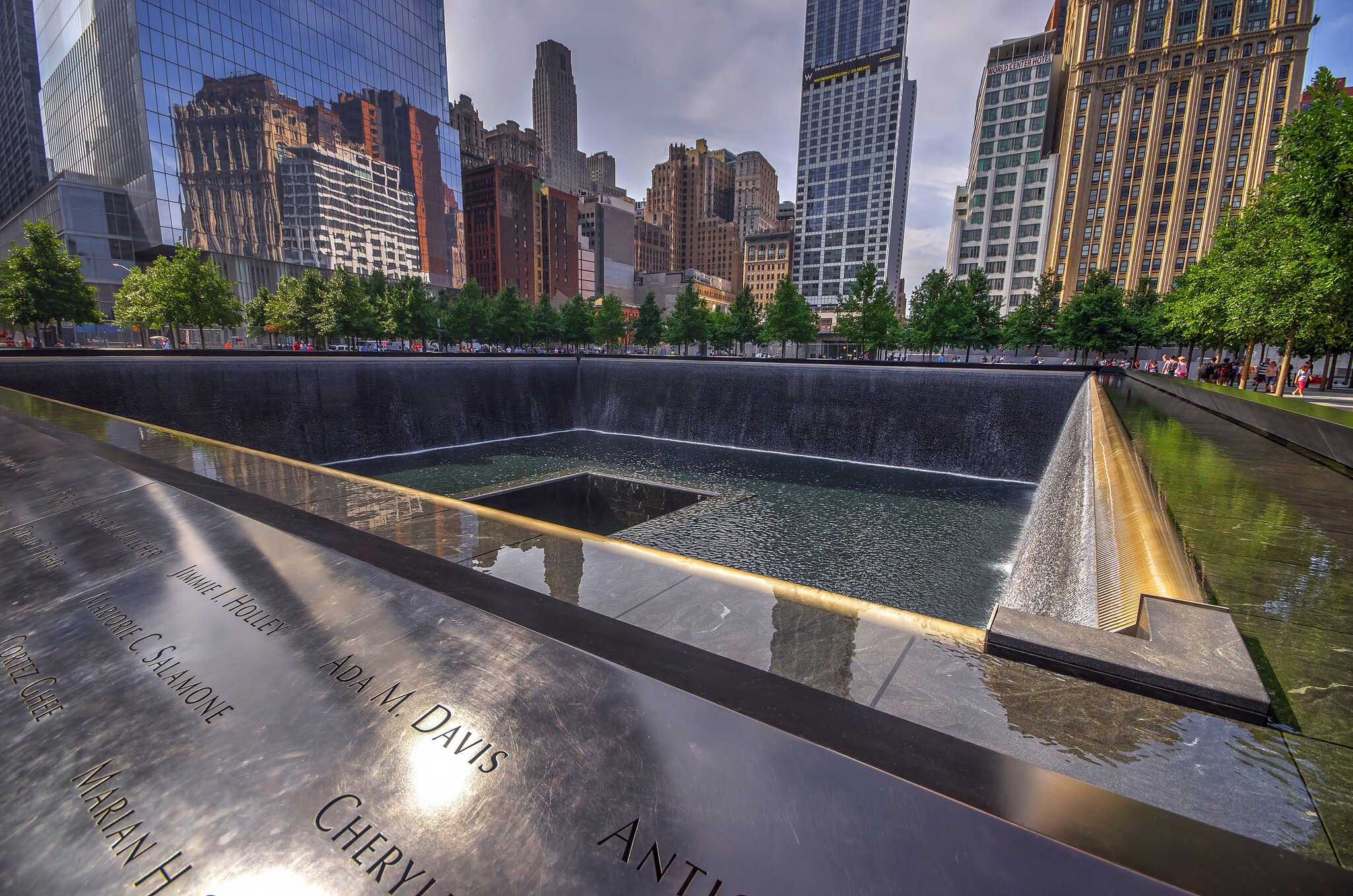 The National September 11 Memorial & Museum (also known as the 9/11 Memorial and 9/11 Memorial Museum) is the principal memorial and museum commemorating the September 11 attacks of 2001. The memorial is located at the World Trade Center site, Manhattan, New York. Photo taken in August
525749557
Outdoors, International Landmark, Horizontal, Photography, World, World Trade Center - Manhattan, New York City, Memorial, Cityscape, Manhattan - New York City, USA, Skyscraper, NY, National September 11 Memorial & Museum