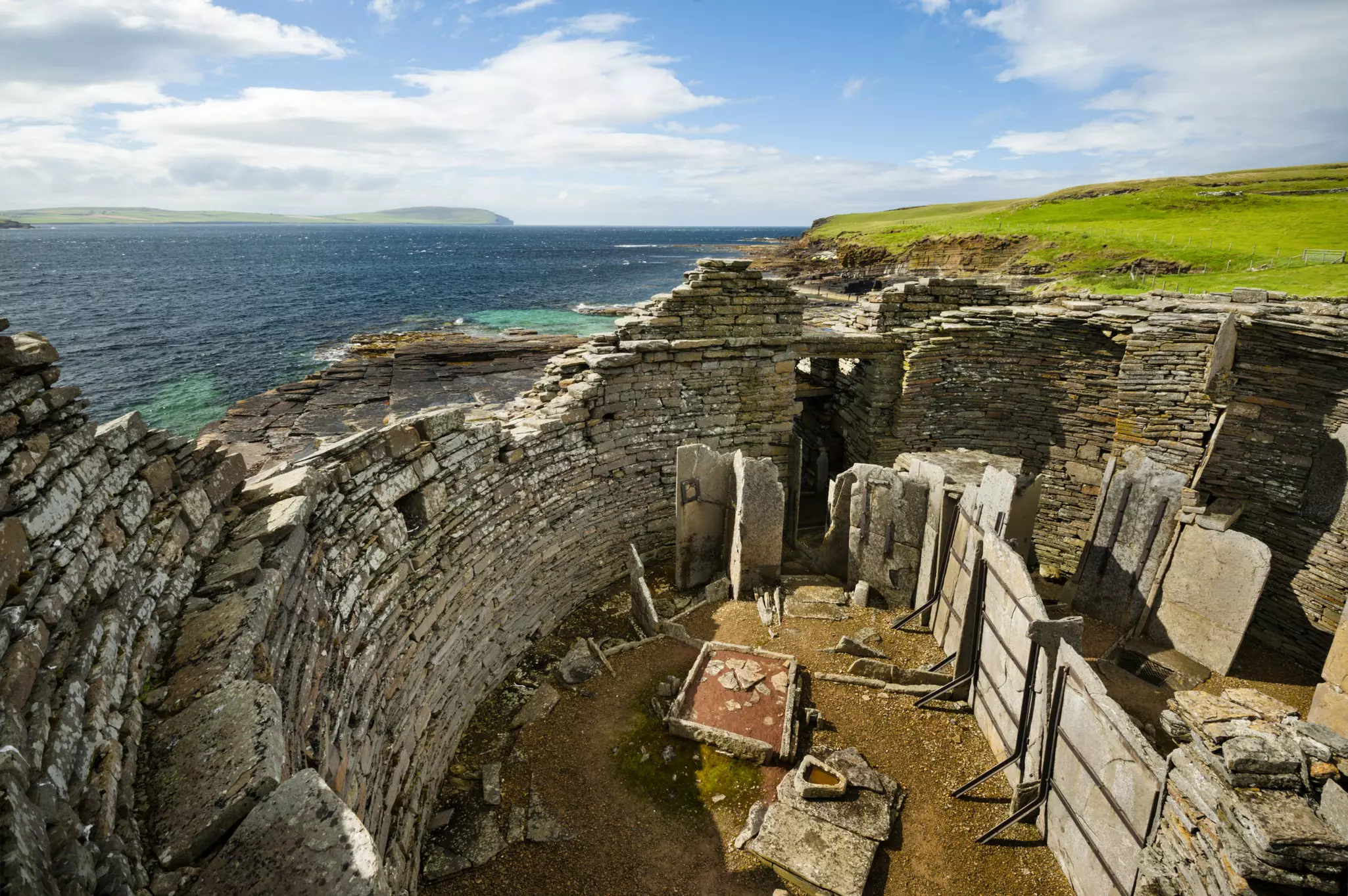 The ruined walls of Midhowe Cairn and Broch, Rousay, Orkney, Scotland.