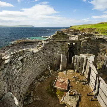 The ruined walls of Midhowe Cairn and Broch, Rousay, Orkney, Scotland.