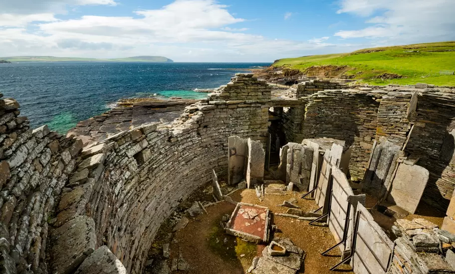 The ruined walls of Midhowe Cairn and Broch, Rousay, Orkney, Scotland.