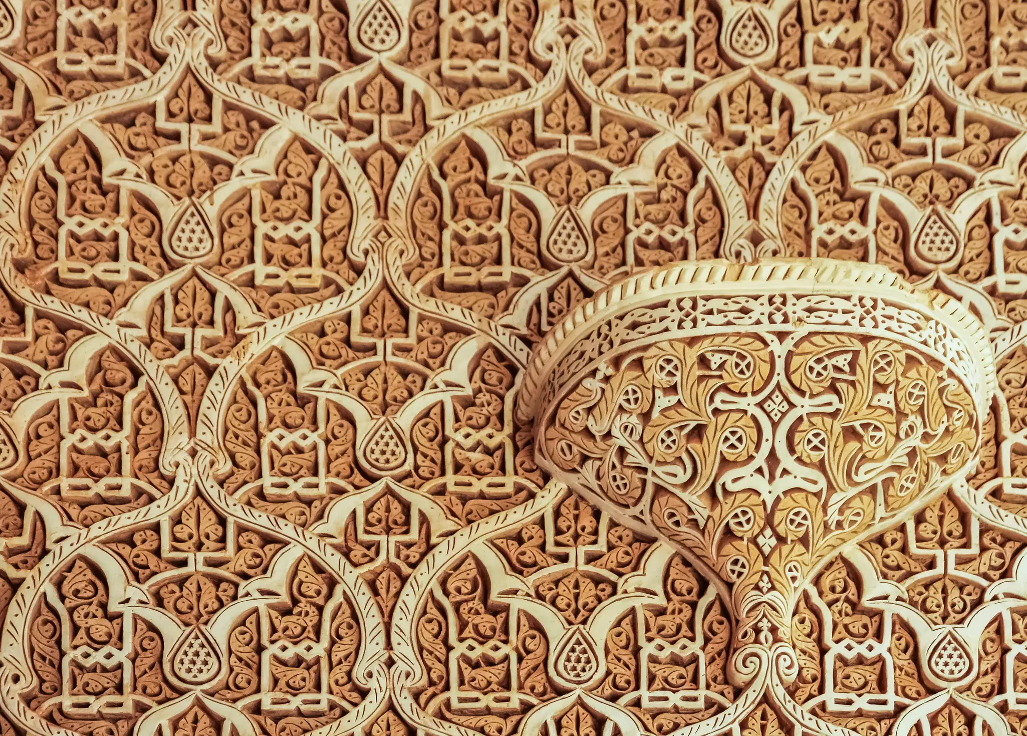 intricate spiral and vase-shaped carvings