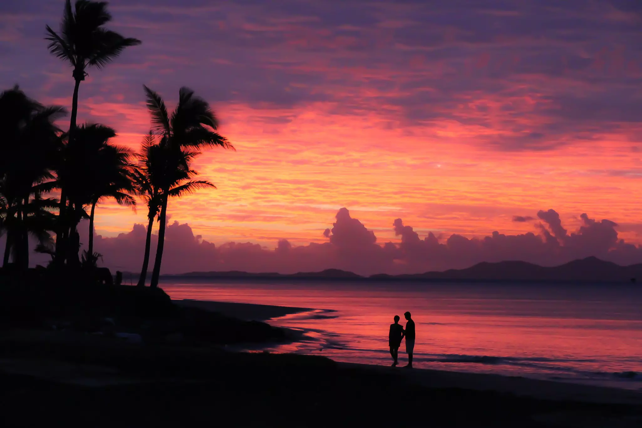 A rich magenta and orange sunset on Denarau in Fiji