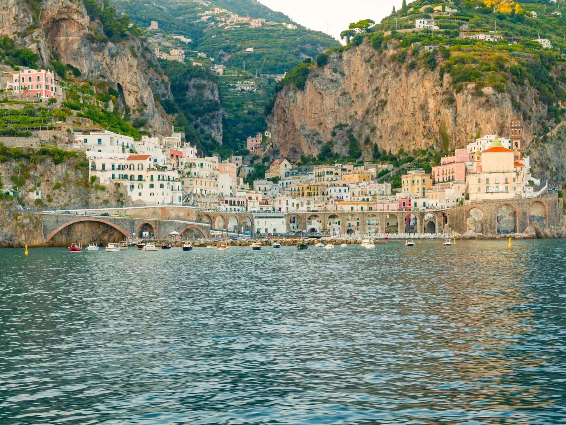 The photo captures the stunning towns of Amalfi and Atrani on the Amalfi Coast, with colorful cliffside buildings, historic churches, and breathtaking views of the turquoise sea and lush hills., License Type: media, Download Time: 2025-06-25T19:27:14.000Z, User: Sarahstocking, Editorial: false, purchase_order: 65050 - Digital Destinations and Articles, job: Digital, client: First time guide Atrani Italy, other: Sarah Stocking