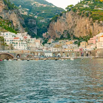 The photo captures the stunning towns of Amalfi and Atrani on the Amalfi Coast, with colorful cliffside buildings, historic churches, and breathtaking views of the turquoise sea and lush hills., License Type: media, Download Time: 2025-06-25T19:27:14.000Z, User: Sarahstocking, Editorial: false, purchase_order: 65050 - Digital Destinations and Articles, job: Digital, client: First time guide Atrani Italy, other: Sarah Stocking