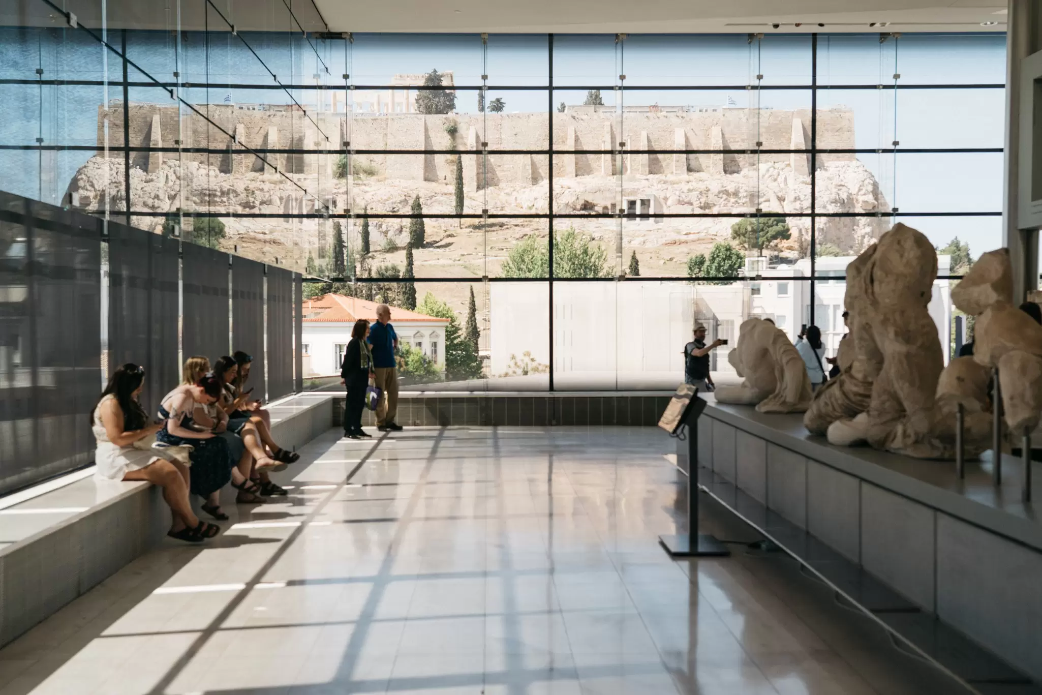 Tourists in the Acropolis Museum, Greece.