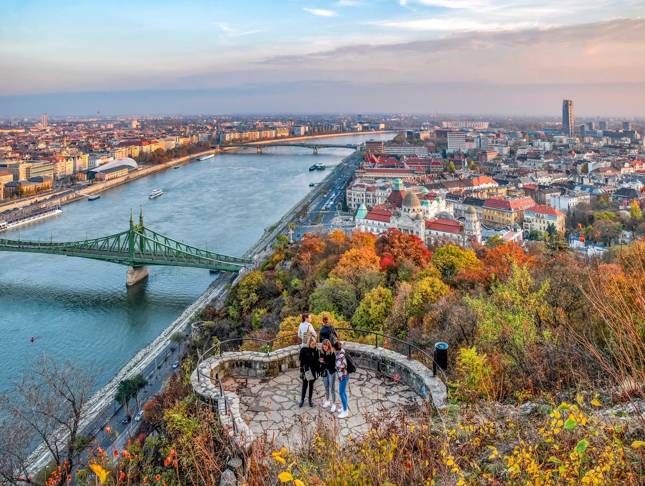Aerial view of the Danube River from the Gellért Hill scenic viewpoint on a sunny autumn day in Budapest, Hungary.