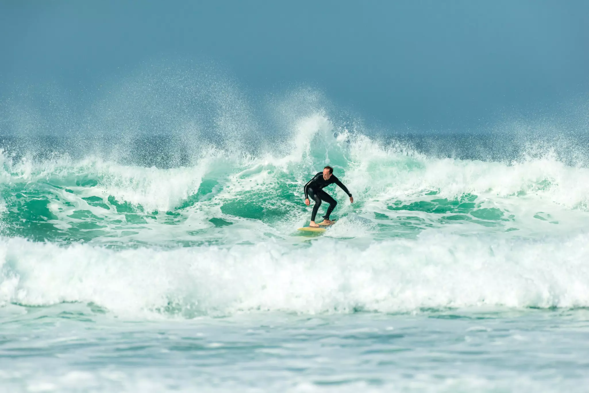 Newquay's Fistral Beach is one of England's best-known surf spots. 10c_Photoclub/Shutterstock