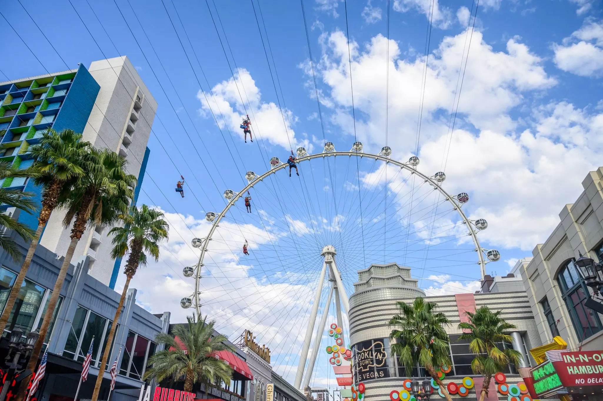 Fly LINQ is a zipline that stretches over 1,100 feet and 12 stories high over the LINQ Promenade © Courtesy of Travel Nevada