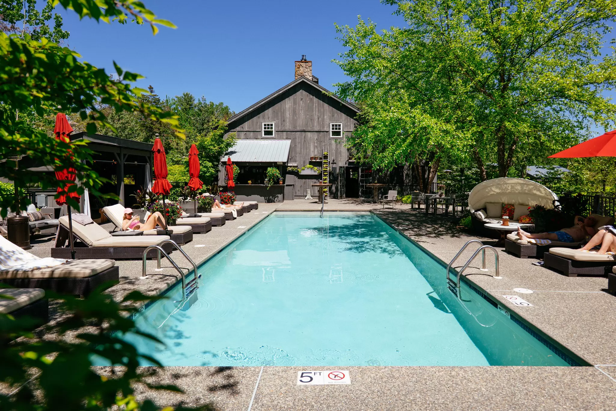 The adults-only pool at Hidden Pond resort. Kennebunkport, Maine, USA.