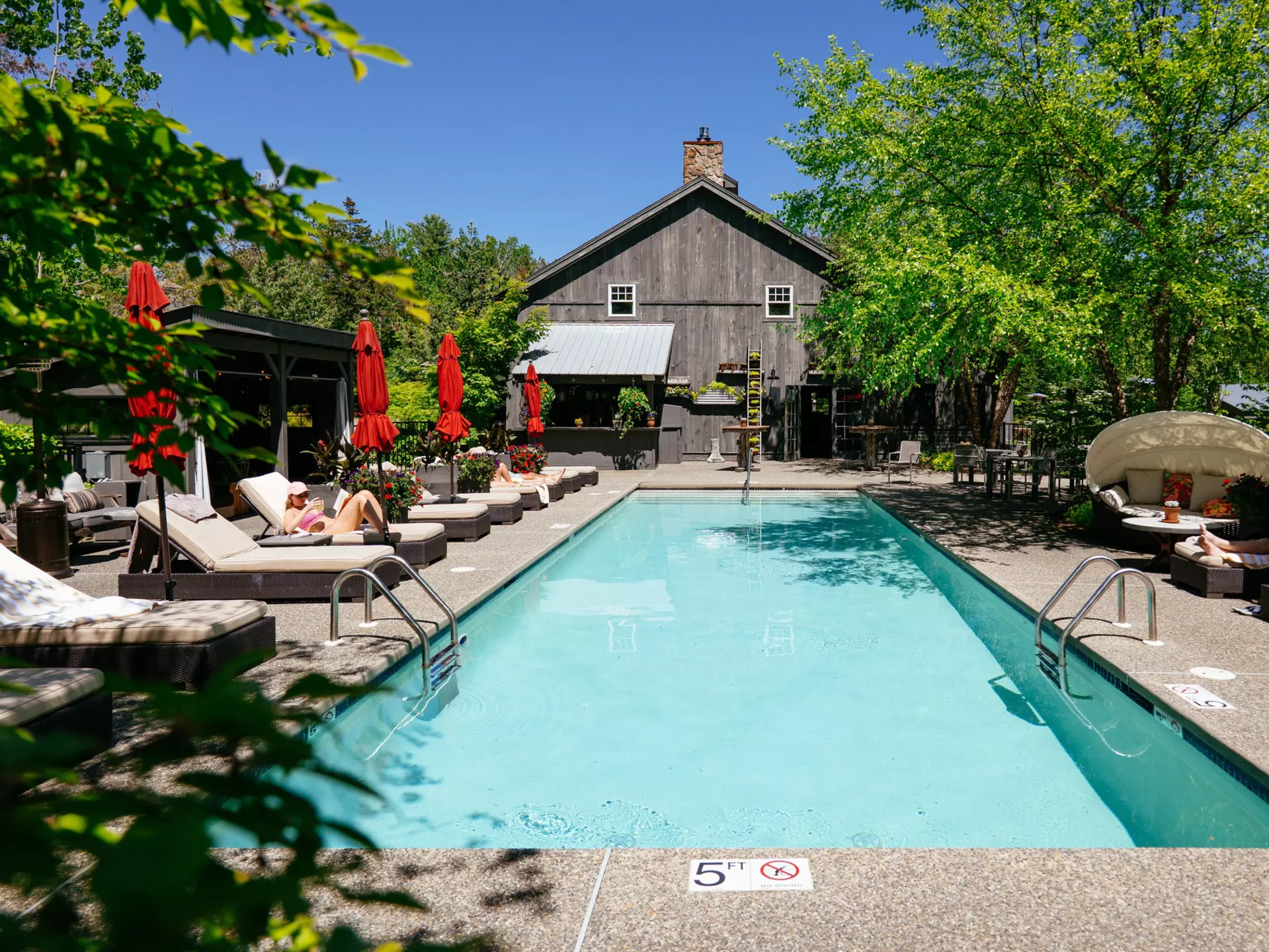 The adults-only pool at Hidden Pond resort. Kennebunkport, Maine, USA.