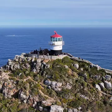 Cape Point Lighthouse in Table Mountain National Park in Cape Town, South Africa. ByDroneVideos/Shutterstock