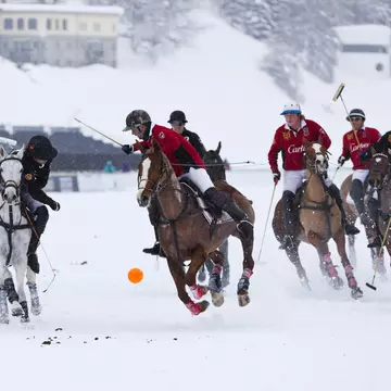 Snow Polo is just as glamorous in the winter months. Stockwerk / Getty Images