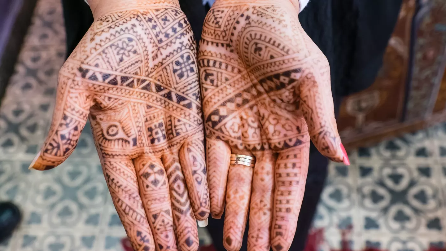 Temporary henna tattos on the hands of a woman in Marakkech.