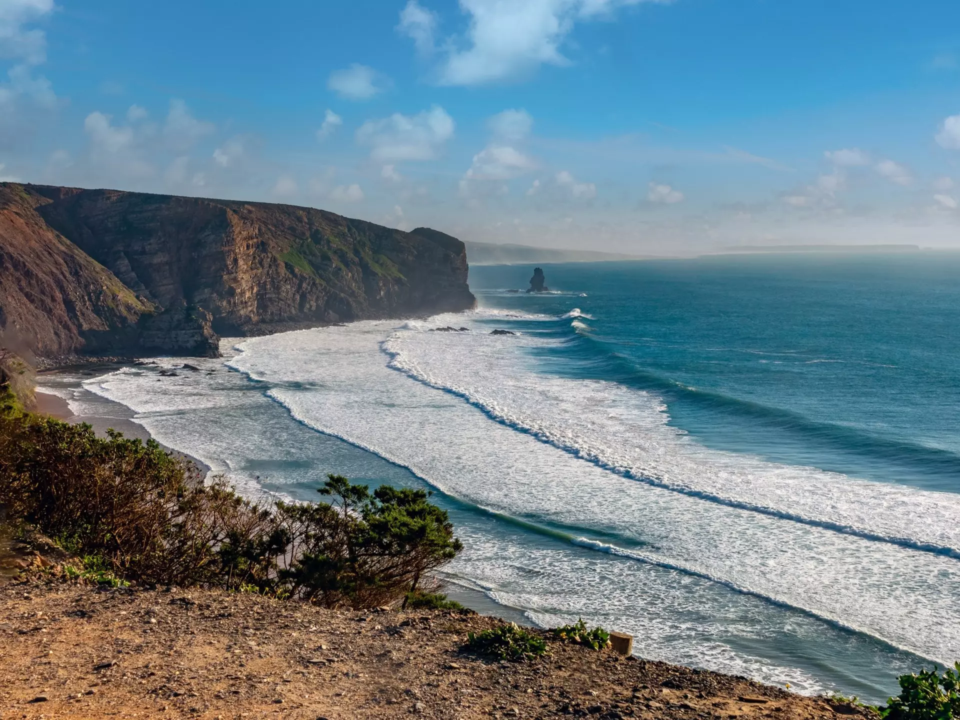 Stunning view of Arrifana beach (Praia da Arrifana), Aljezur,  Vicentine Coast Natural Park, Aljezur, Algarve, Portugal.
