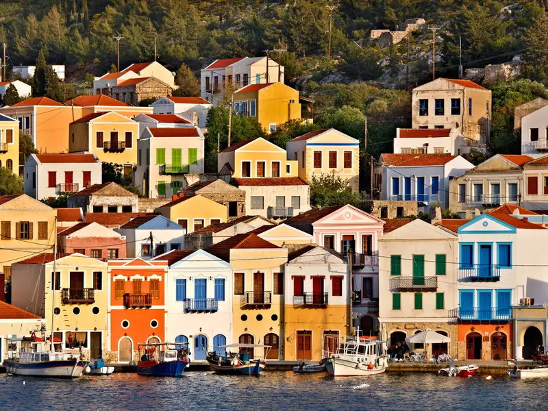 Rows of colorful buildings on a terraced hillside.