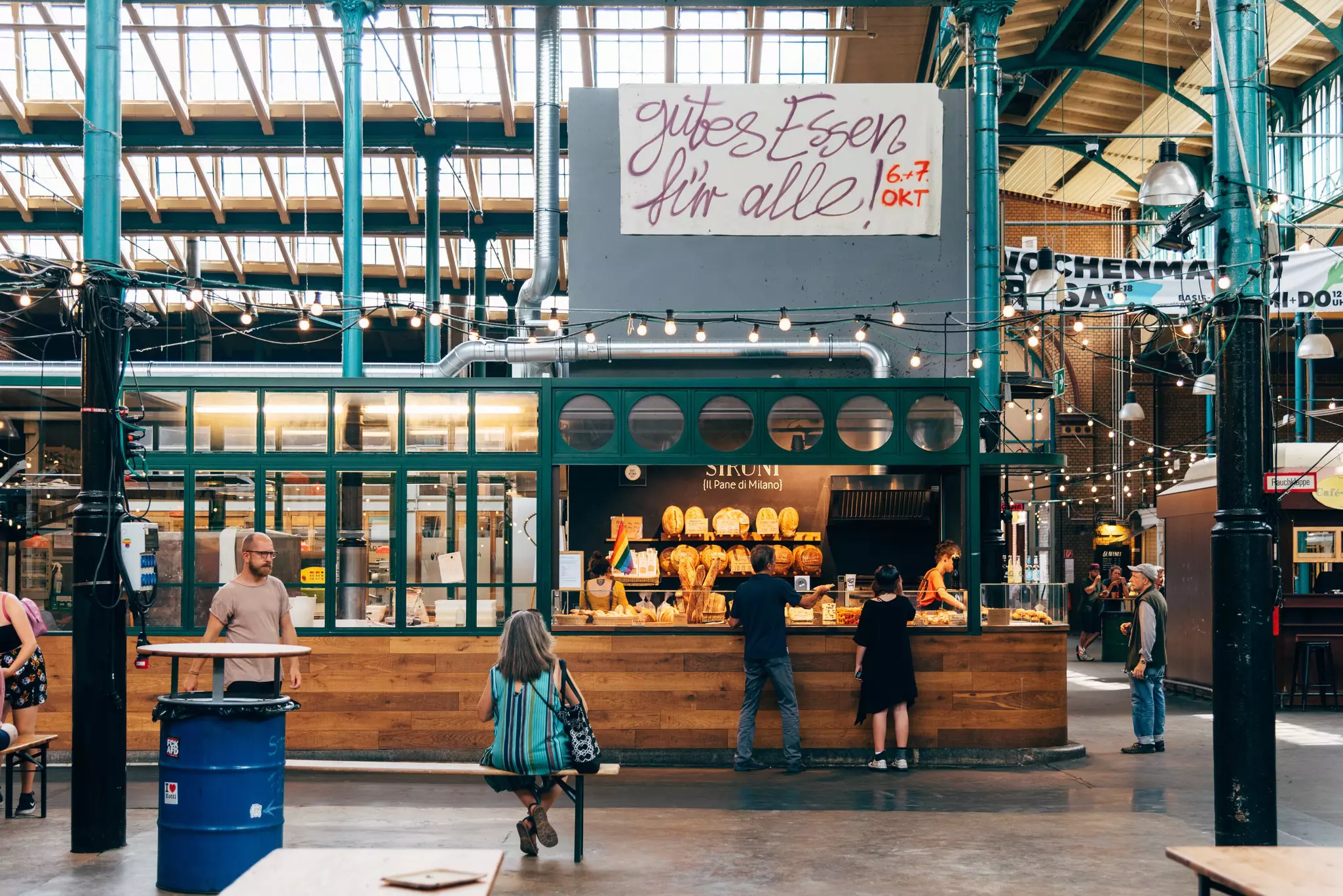 Markthalle Neun (Market Hall Nine) is a historic market with street food in Kreuzberg borough © JJFarquitectos / Getty