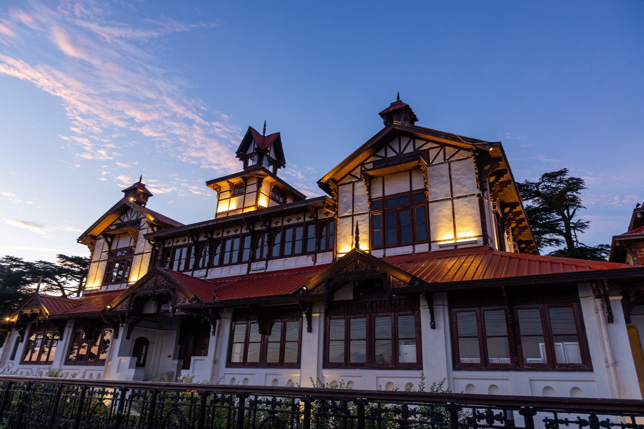 Facade of Bantony Castle lit up at night in Shimla, Himachal Pradesh, India.