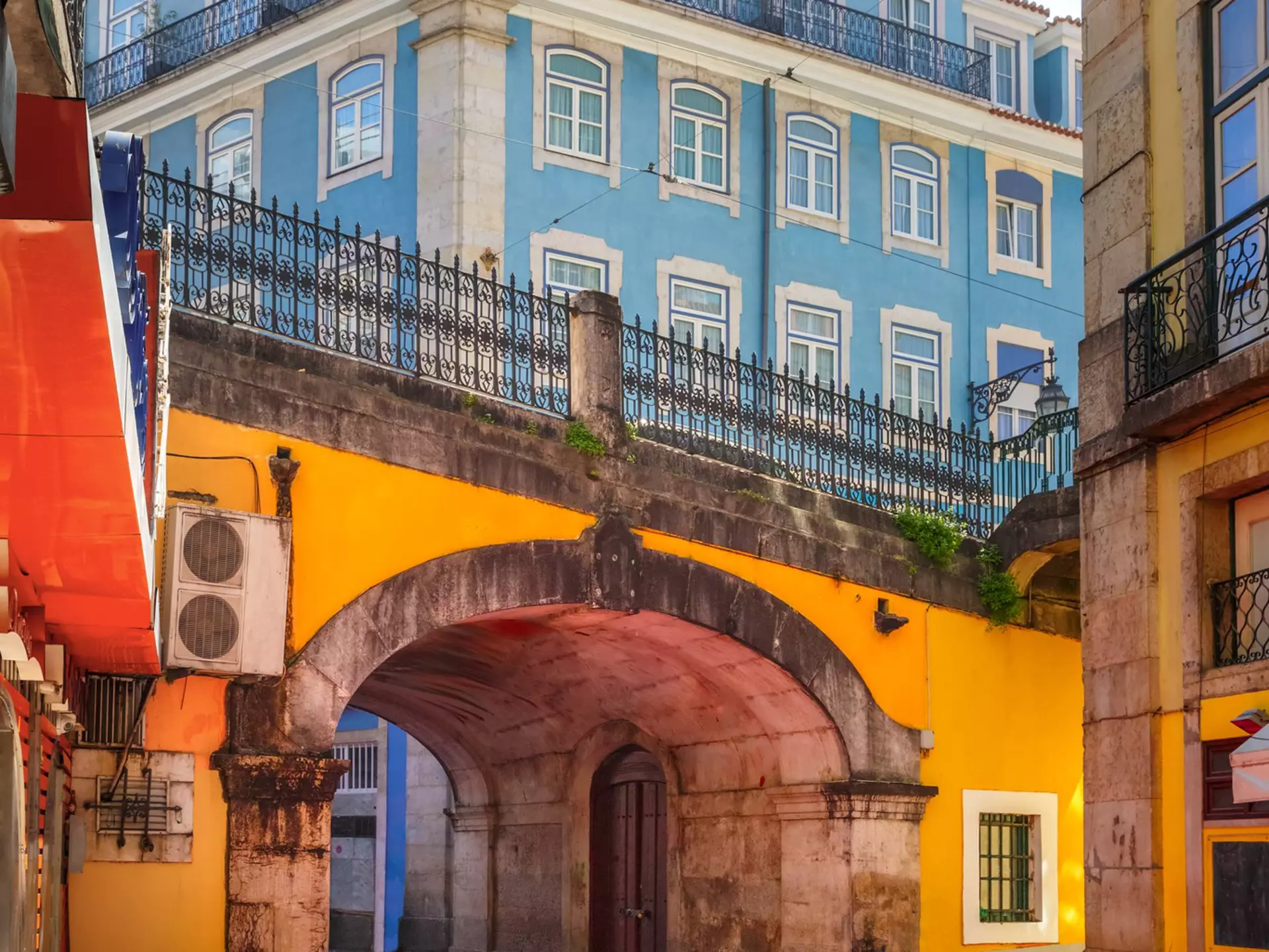 The famous pedestrian Pink Street of Rua Nova do Carvalho in Lisbon, Portugal