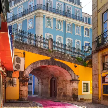 The famous pedestrian Pink Street of Rua Nova do Carvalho in Lisbon, Portugal