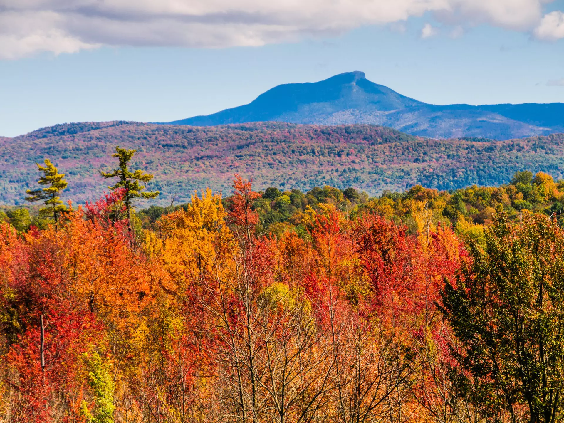 Brilliant fall foliage covers the valleys below Camel's Hump Mountain (4083 feet).