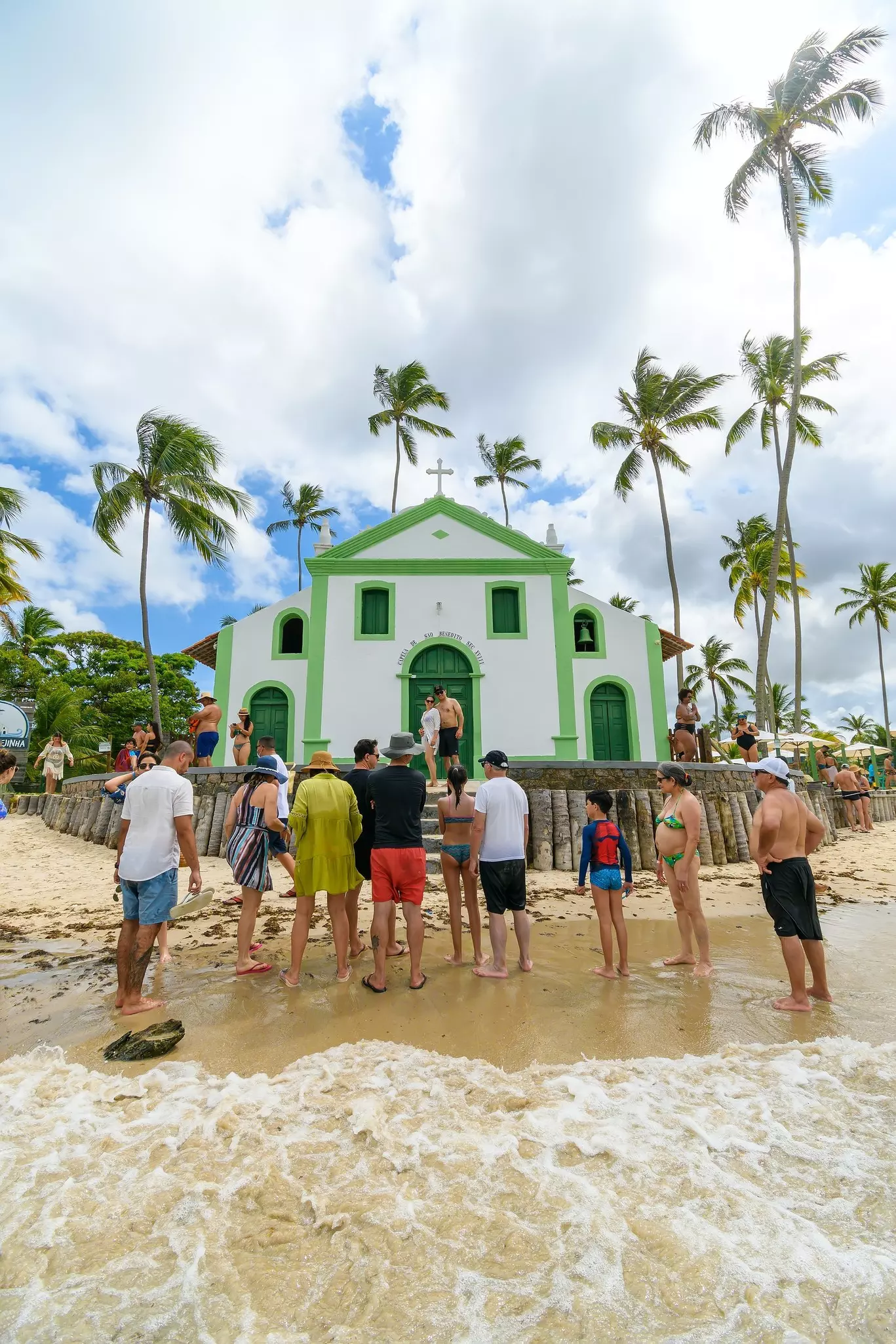 Tourists taking photos at Igrejinha dos Carneiros, the chapel of Saint Benedict. Porto de Galinhas.