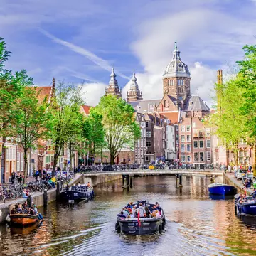 Amsterdam harbour with Merchant style houses in background