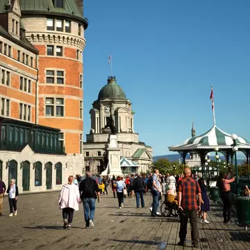 QUEBEC-CANADA, SEPT 12, 2019:  People walking on Terrasse Dufferin close the Chateau Frontenac, an historic hotel in Quebec City, Quebec, Canada, one of the most photographed in the world.  License Type: media  Download Time: 2022-02-17T15:25:53.000Z  User: gwencotter  Is Editorial: Yes  purchase_order:   