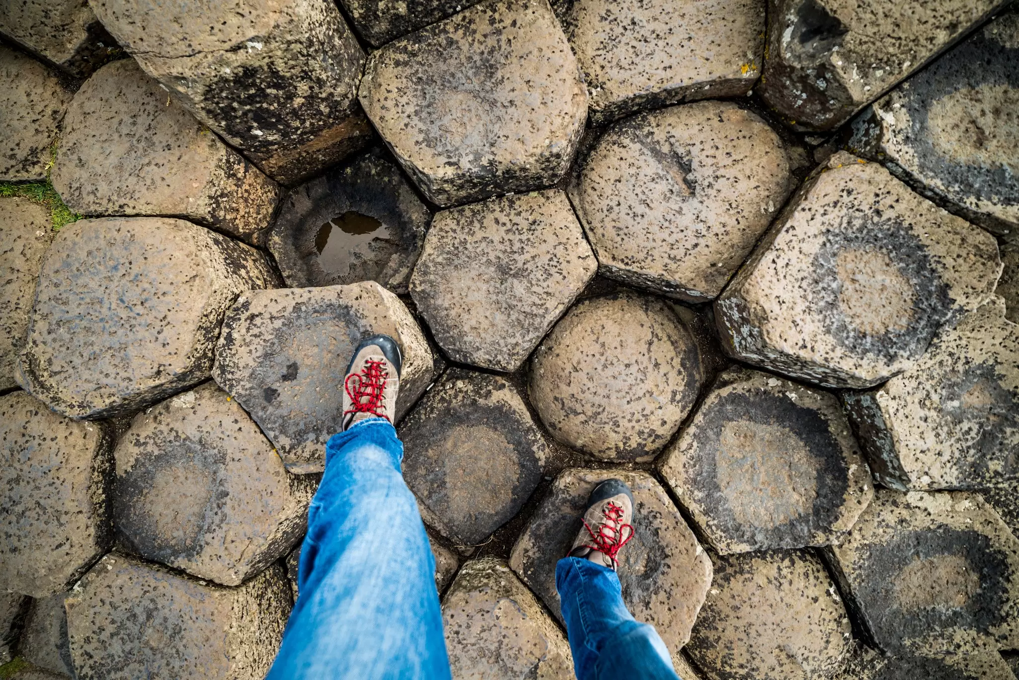 Following the steps
Shoe Footprint Nature Research Vacations Travel Destinations Horizontal Outdoors Human Body Part Human Foot Hiking Natural Phenomenon Tourist UK Famous Place Rock Formation Rock - Object Basalt Basalt Column Giants Causeway Northern Ireland County Antrim Geology Rock Strata Causeway Photography Travel Foot