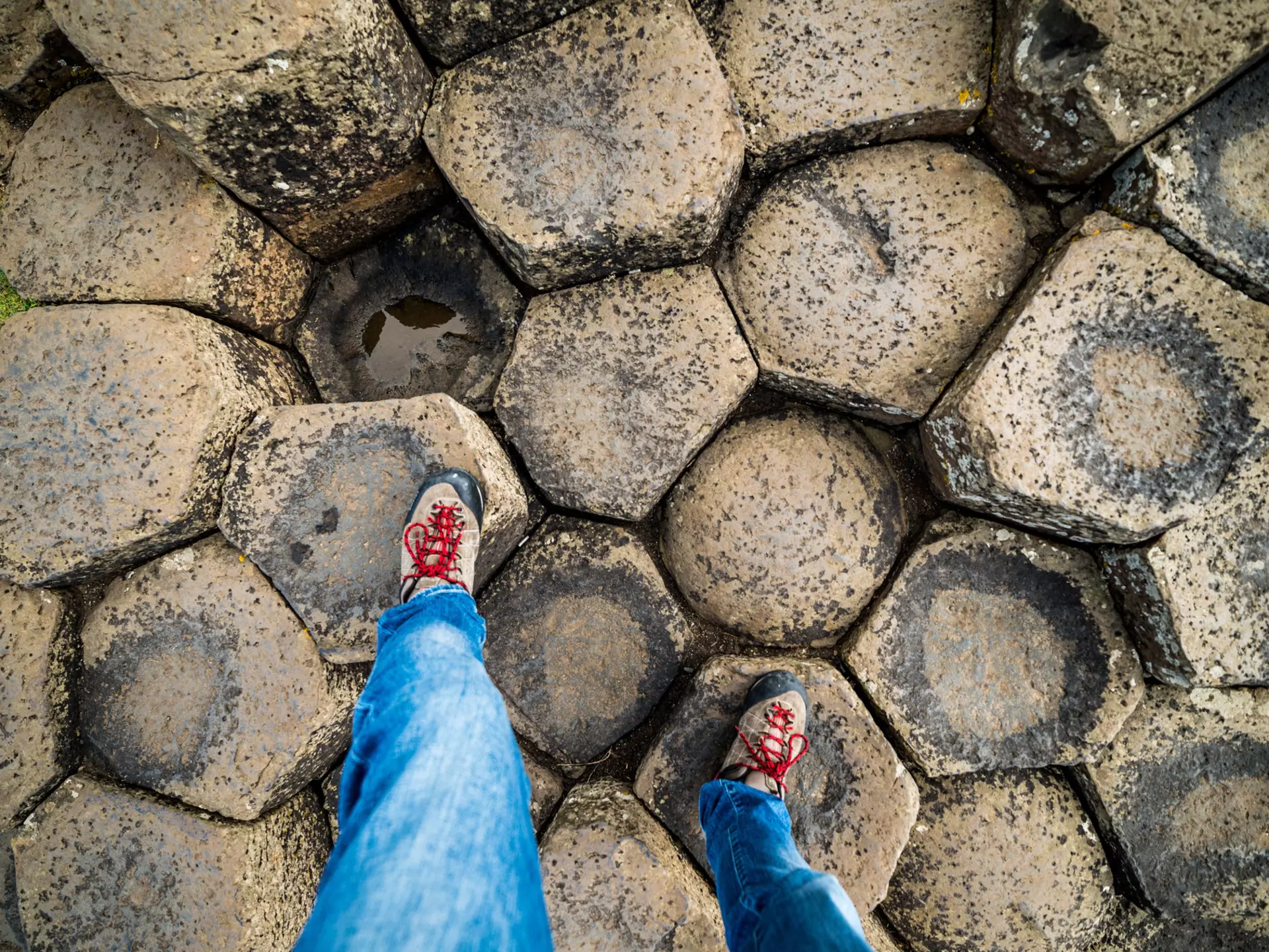 Following the steps
Shoe Footprint Nature Research Vacations Travel Destinations Horizontal Outdoors Human Body Part Human Foot Hiking Natural Phenomenon Tourist UK Famous Place Rock Formation Rock - Object Basalt Basalt Column Giants Causeway Northern Ireland County Antrim Geology Rock Strata Causeway Photography Travel Foot