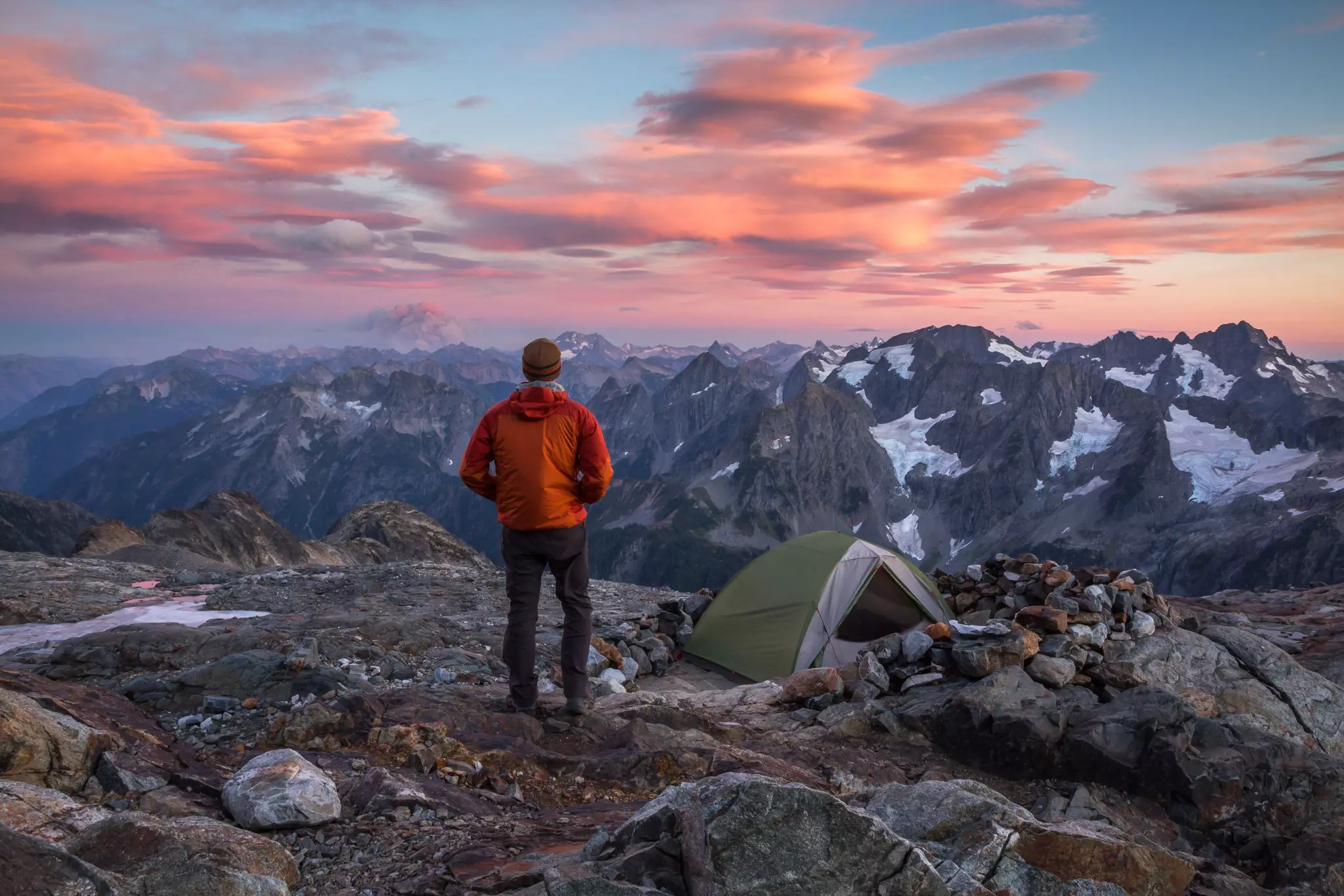 Hiker stands at his mountain top camp during sunset in North Cascades National Park.
346918262
backpacker, backpacking, camping, cascades, clouds, color, crag, glaciers, hiker, hiking, mountains, peak, ridge, rocky, rugged, sky, skyline, summit, sunset, tent, views, washington, wilderness