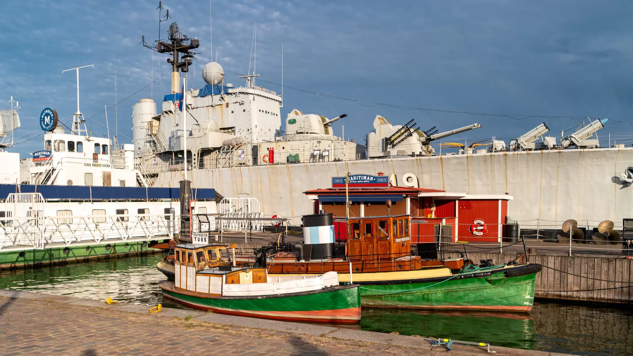 Gothenburg, Sweden - June 25, 2019: The open air museum 'Maritiman' with destroyer HMS Smaland and boat Stormprincess.  View from the embankment at the ships and boats., License Type: media, Download Time: 2025-08-08T01:33:18.000Z, User: rhylton_redventures, Editorial: true, purchase_order: 65050 - Digital Destinations and Articles, job: Lonely Planet, client: wip, other: Rhianydd Hylton