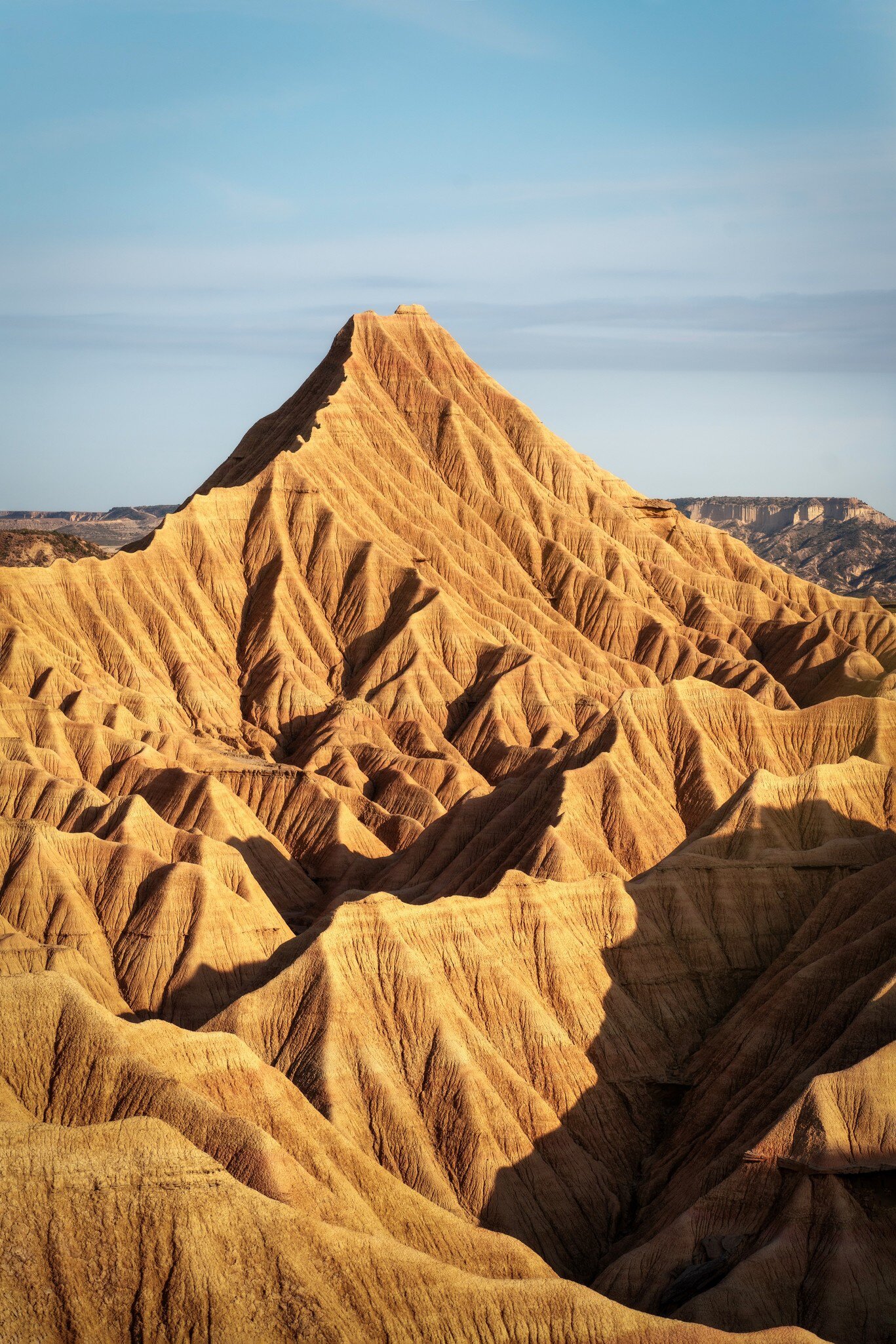 View of rock formations in the Parque Natural de las Bardenas Reales in Spain.